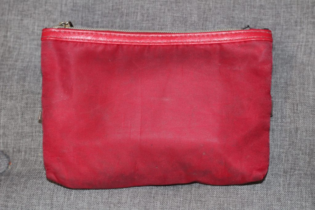 Make-up bag turned travel wallet for solo travels