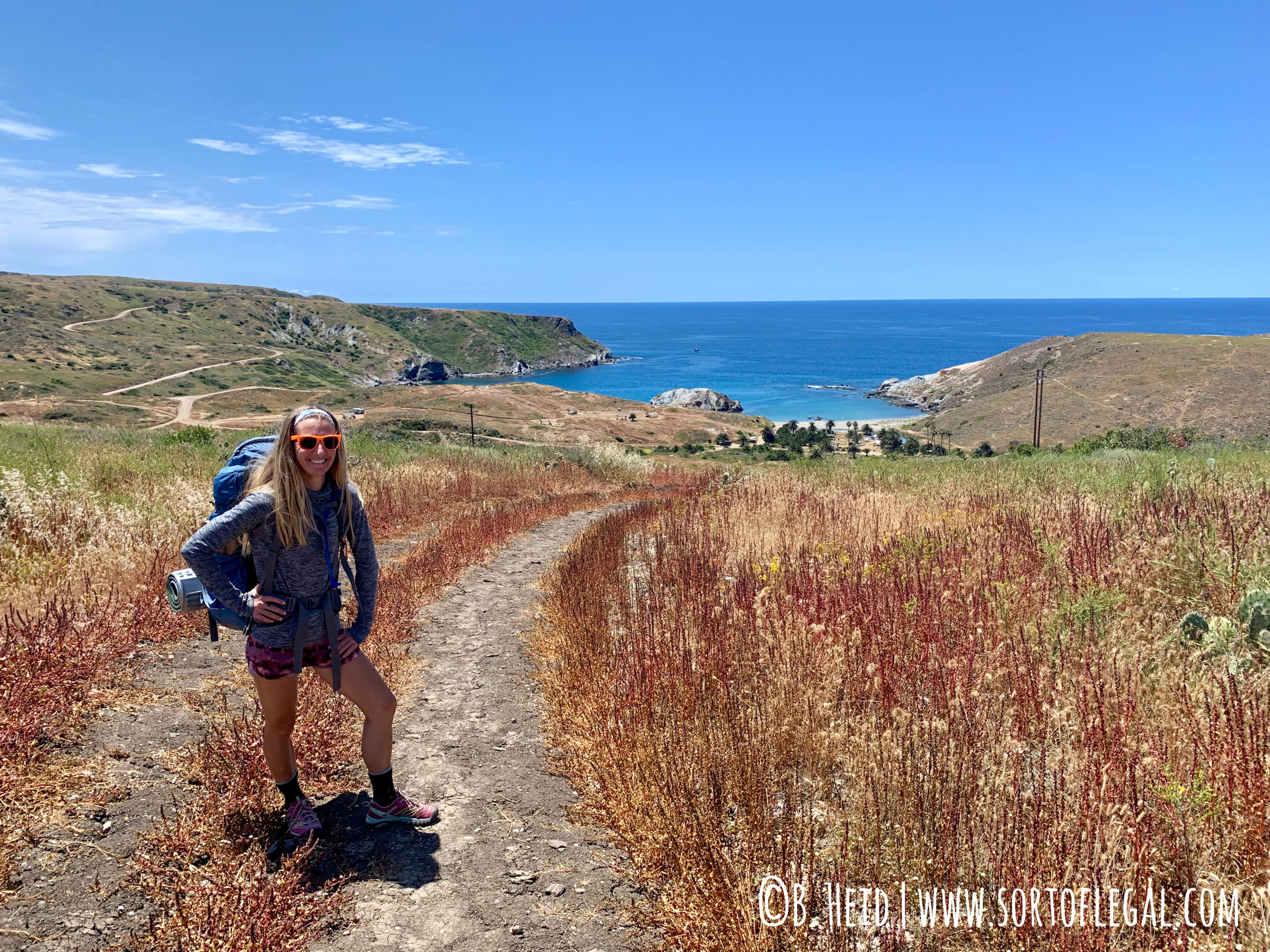 Female Backpacking the Trans-Catalina Trail, Catalina Island, California - Heading into Little Harbor