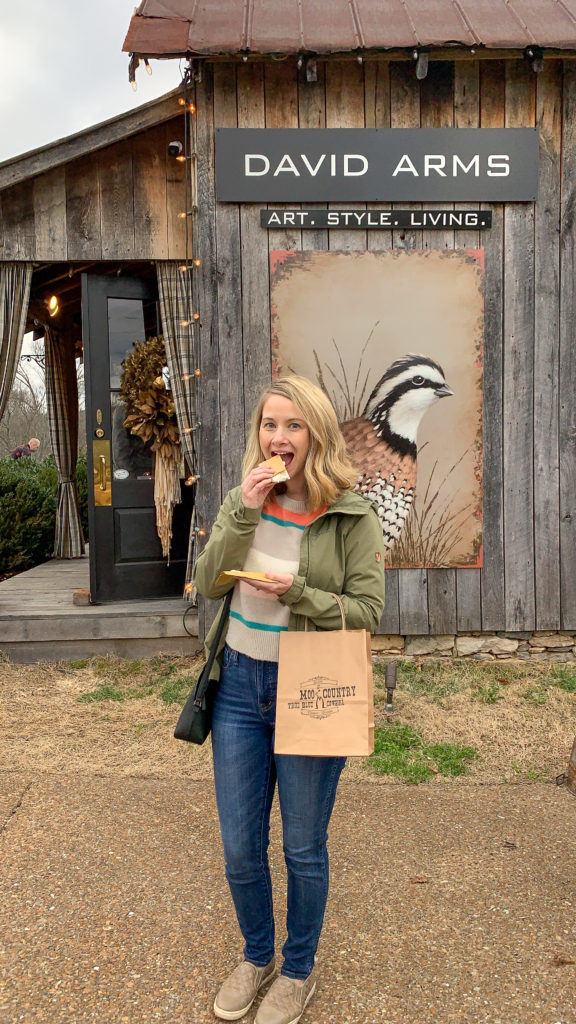 Andrea Knox eating marshmallows at Leiper's Fork outside David Arms Gallery